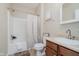 Well-lit bathroom featuring a vanity with storage, a standard toilet, and a bathtub/shower combo at 16768 Maraschino Dr, Noblesville, IN 46062