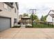 Fenced backyard with concrete, gazebo, basketball hoop, and play set area at 1680 Arbor Springs Dr, Brownsburg, IN 46112