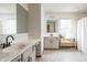 Bright bathroom with double vanity, natural light, and modern fixtures creating a clean and inviting space at 1680 Arbor Springs Dr, Brownsburg, IN 46112