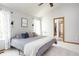 Bright bedroom featuring plush bedding, neutral walls, and an en-suite closet, offering a comfortable retreat at 1680 Arbor Springs Dr, Brownsburg, IN 46112