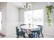 Cozy breakfast nook featuring a round table, four chairs, and bright natural light at 1680 Arbor Springs Dr, Brownsburg, IN 46112