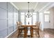 Well-lit dining room with an elegant chandelier at 1680 Arbor Springs Dr, Brownsburg, IN 46112