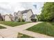Suburban home exterior with neat lawn and driveway at 1680 Arbor Springs Dr, Brownsburg, IN 46112