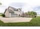 Lovely home featuring a long driveway, two-car garage, basketball hoop, and backyard entertainment space at 1680 Arbor Springs Dr, Brownsburg, IN 46112