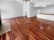 Spacious living room with gleaming hardwood floors and vaulted ceiling at 1726 Creekside W Ln, Carmel, IN 46032
