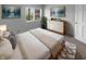 Cozy bedroom with a dresser, a large bed, and decor that creates a peaceful environment at 1726 Creekside W Ln, Carmel, IN 46032