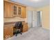 This sunny bedroom includes built in cabinets and a desk area, perfect for an office at 1817 Edgewood Dr, Anderson, IN 46011