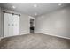 Spacious bedroom featuring a large closet and neutral carpet; creating a serene and functional living space at 1825 E Maryland St, Indianapolis, IN 46201