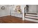Entryway with stylish console table, staircase, and sliding barn door at 1825 E Maryland St, Indianapolis, IN 46201