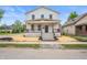 Charming two-story home featuring a covered front porch and modern curb appeal at 1825 E Maryland St, Indianapolis, IN 46201