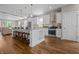 Open-concept kitchen with a large island and views of the living room at 1825 E Maryland St, Indianapolis, IN 46201