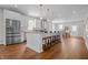 Spacious kitchen with stainless steel appliances, a large island, and dining area at 1825 E Maryland St, Indianapolis, IN 46201