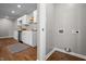 Modern kitchen featuring stainless steel appliances, white cabinets, and butcher block countertops at 1825 E Maryland St, Indianapolis, IN 46201