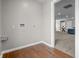 Laundry area with hardwood floors and hookups at 1825 E Maryland St, Indianapolis, IN 46201