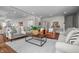 Spacious living room with hardwood floors and neutral color scheme at 1825 E Maryland St, Indianapolis, IN 46201