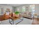 Bright living room with modern furnishings and lots of natural light at 1825 E Maryland St, Indianapolis, IN 46201