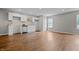 Open-concept living space with newly renovated kitchen and hardwood floors at 1825 E Maryland St, Indianapolis, IN 46201
