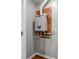 Efficient utility area with an AO Smith water heater and exposed plumbing; combining functionality with practicality at 1825 E Maryland St, Indianapolis, IN 46201