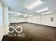 Large carpeted room with minimal lighting at 1927 E 125 S, Franklin, IN 46131