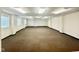 Spacious, empty room ready for customization and features neutral carpet at 1927 E 125 S, Franklin, IN 46131