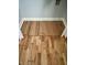 Hardwood flooring with a hidden trap door is an added bonus for storage or utilities at 1927 E 125 S, Franklin, IN 46131