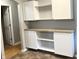 A kitchen nook with white cabinets, shelving, and counter space at 1927 E 125 S, Franklin, IN 46131