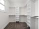 Spacious walk-in closet with custom shelving and hanging racks, offering ample storage space at 2024 Yandes St, Indianapolis, IN 46202