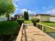 Beautiful backyard view, with a bridge leading to a well-maintained lawn, perfect for outdoor activities and relaxation at 204 Meadow Creek S Dr, Whiteland, IN 46184
