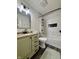 Modern bathroom with tub, tiled shower, and stylish vanity at 204 Meadow Creek S Dr, Whiteland, IN 46184
