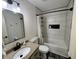 Modern bathroom with tub, tiled shower, granite countertop and dark fixtures at 204 Meadow Creek S Dr, Whiteland, IN 46184