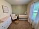 This Bedroom has neutral paint, a crib, and a dresser at 204 Meadow Creek S Dr, Whiteland, IN 46184