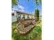 Charming deck featuring a quaint sitting area and landscaped surroundings, perfect for relaxing and enjoying the outdoors at 204 Meadow Creek S Dr, Whiteland, IN 46184
