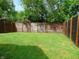 Private fenced backyard with lush green grass, perfect for outdoor activities and relaxation at 2116 Galaxy Dr, Franklin, IN 46131