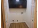 Dedicated laundry room with modern cabinets and utility connections for washer and dryer at 2116 Galaxy Dr, Franklin, IN 46131
