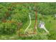 An aerial view of the wooded property with a defined lot line and long driveway at 2935 N Grizzly Ln, Martinsville, IN 46151