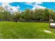 The backyard is a large, flat, usable space, with a playset and privacy fence at 2935 N Grizzly Ln, Martinsville, IN 46151
