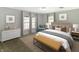 Serene bedroom with neutral tones, soft lighting, and comfortable furnishings, offering a peaceful retreat for rest and relaxation at 2935 N Grizzly Ln, Martinsville, IN 46151