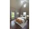 Comfortable bedroom with stylish decor, natural light, and a cozy seating area, offering a relaxing and inviting space at 2935 N Grizzly Ln, Martinsville, IN 46151