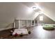 Versatile bonus room with a unique design, hardwood floors, and ample space for recreation and relaxation at 2935 N Grizzly Ln, Martinsville, IN 46151