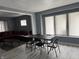 Open-concept Dining Area with gray walls and lots of light at 322 S Rural St, Indianapolis, IN 46201
