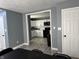 View of the kitchen, showcasing stainless steel appliances, white cabinets and gray backsplash at 322 S Rural St, Indianapolis, IN 46201