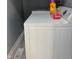 Laundry room showcasing a washing machine and a dryer, with laundry supplies on top at 322 S Rural St, Indianapolis, IN 46201