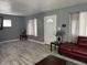 Bright living room with modern gray paint, light-colored floors, and plenty of natural light at 322 S Rural St, Indianapolis, IN 46201
