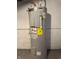 AO Smith Signature 100 water heater against a white brick wall at 322 S Rural St, Indianapolis, IN 46201
