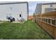 Fenced backyard with a grill and patio set at 3292 Underwood Dr, Whiteland, IN 46184