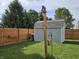 Fenced backyard with a storage shed at 3292 Underwood Dr, Whiteland, IN 46184
