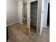 Bathroom view showcasing tile floors, closet, and toilet at 3292 Underwood Dr, Whiteland, IN 46184