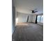 Spacious bedroom features a ceiling fan, plush carpet, and windows with natural light at 3292 Underwood Dr, Whiteland, IN 46184