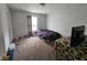 A bedroom with natural light from the window and carpet flooring at 3292 Underwood Dr, Whiteland, IN 46184