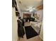 Well-lit bedroom features decor, fan, and a black accent rug to complement the carpet at 3292 Underwood Dr, Whiteland, IN 46184